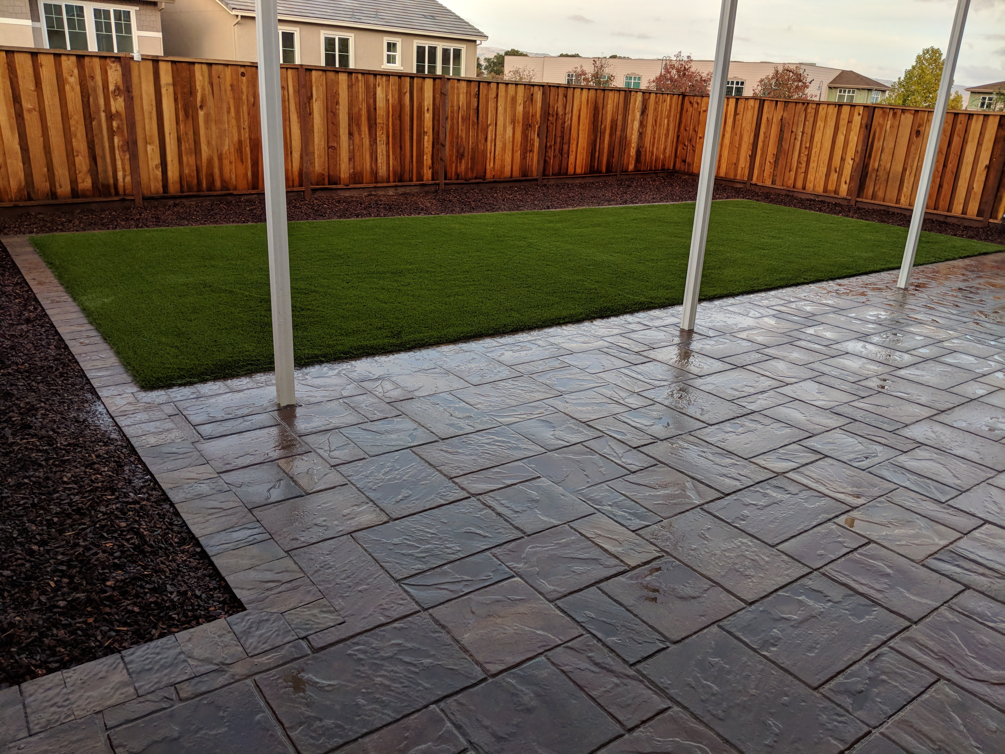 Patios Evergreen Landscape & Concrete; Outdoor Living Space Experts